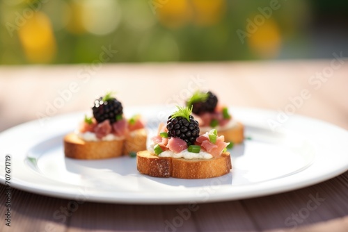 blackberry tartare on mini toasts for appetizer