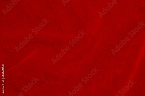 Dark red velvet fabric texture used as background. silk color scarlet fabric background of soft and smooth textile material. crushed velvet .luxury dark tone for silk.