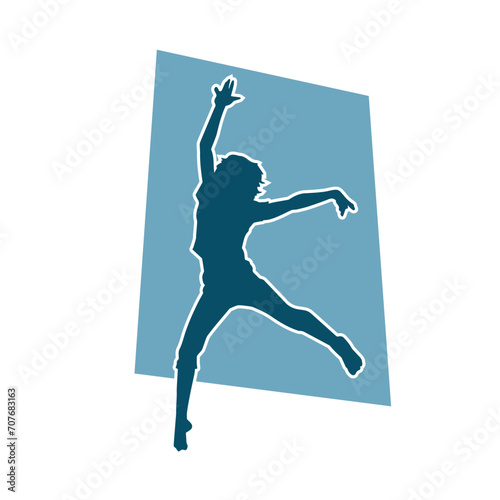 Silhouette of a female dancer in action pose. Silhouette of a woman dancing happily.