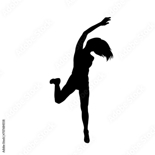 Silhouette of a female dancer in action pose. Silhouette of a woman dancing happily.