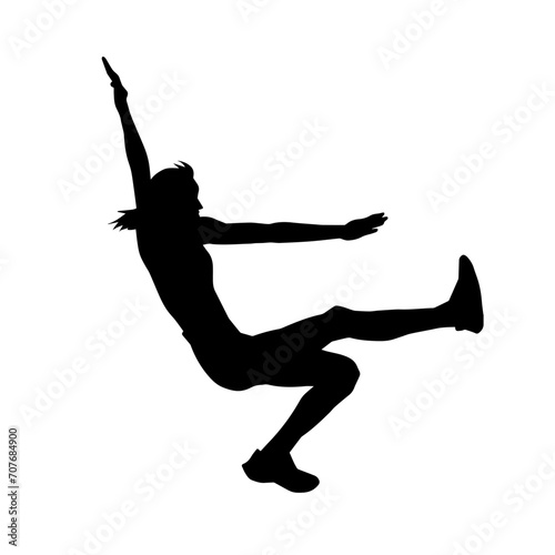 Silhouette of a female dancer in action pose. Silhouette of a woman dancing happily.
