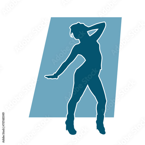 Silhouette of a female dancer in action pose. Silhouette of a woman dancing happily.