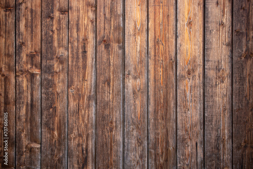 Dark brown wooden boards wall, weathered wood backdrop, abstract texture photo