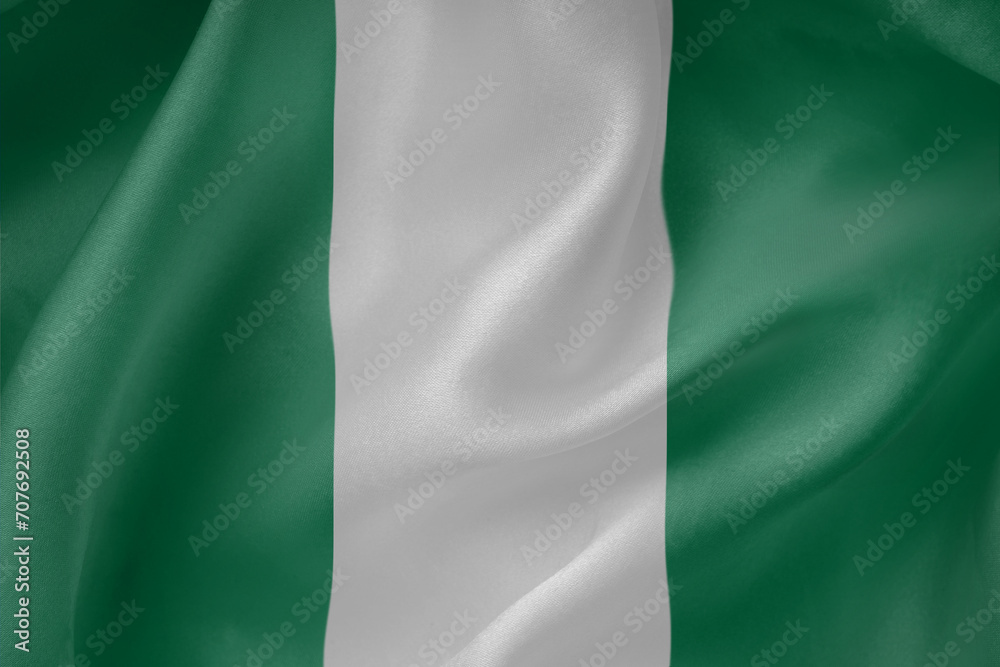 Nigeria waving flag close up fabric texture background Nigeria waving flag close up fabric texture background