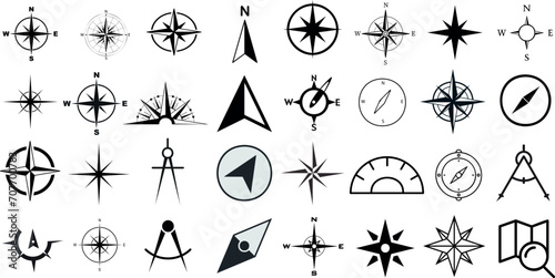 nautical compass navigation icons set. Perfect for marine, sailing, travel themes. 32 black symbols isolated on white background. From simple arrows to complex geometric patterns, find your direction photo