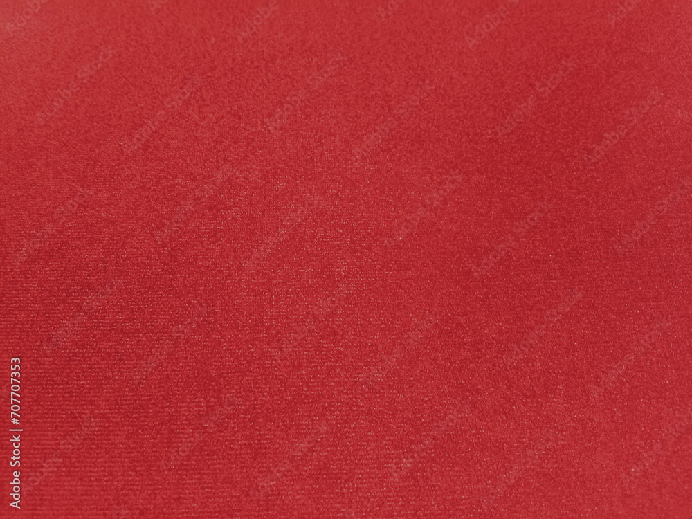 Red velvet fabric background in a luxurious style