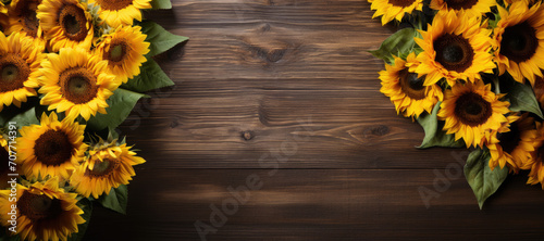 Sunflowers on a wooden background. Flat lay, top view. Copy space for text