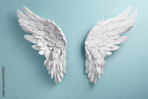 White angel wings on a blue background © Michael