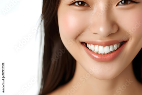 A close-up shot of the lower portion of a asian woman s face. She Charming smile with immaculate teeth for dental service promotions