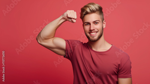 Young strong sporty toned sportsman man isolated on plain red background. Workout sport fit body concept