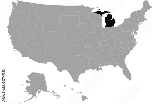 Black Map of US federal state of Michigan within gray map of United States of America