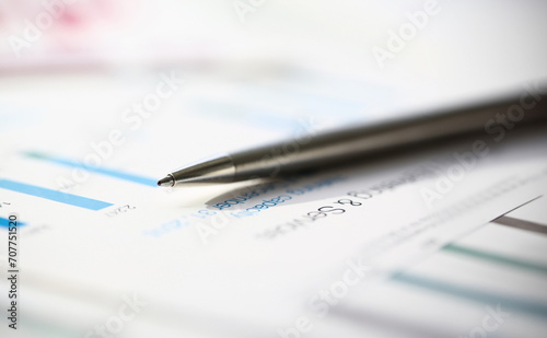 Financial statistics documents ball pen infographics at office table closeup. Internal Revenue Service inspector sum check, investigation, exchange market, earnings, savings, loan and credit concept photo