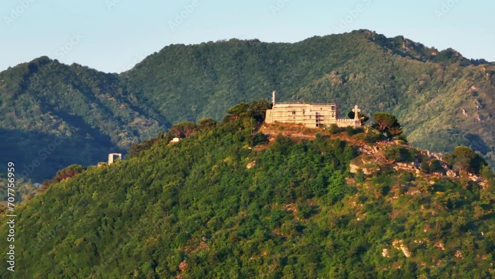 Aerial: drone flying at old medieval abbey perched on mountain top, at sunrise. Italy, Top of the Mountain and Castle, architectural monument, aerial view castle old , Europe Aerial: drone flying at old medieval abbey perched on mountain top, at sunrise. Italy, Top of the Mountain and Castle, architectural monument, aerial view castle old , Europe
