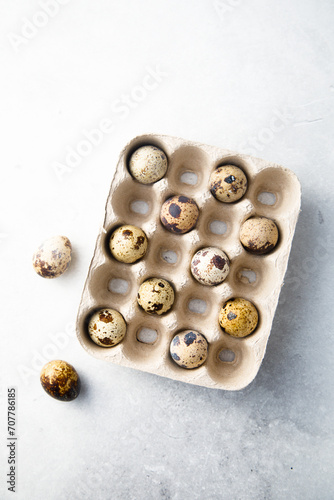 Healthy organic quail eggs in a box