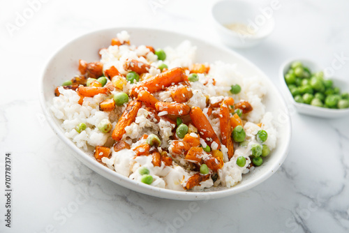 Rice bowl with carrot and pea