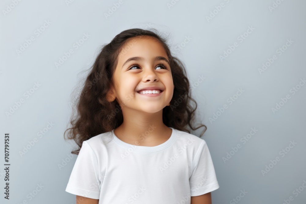 smiling little african american girl in white t-shirt smiling little african american girl in white t-shirt