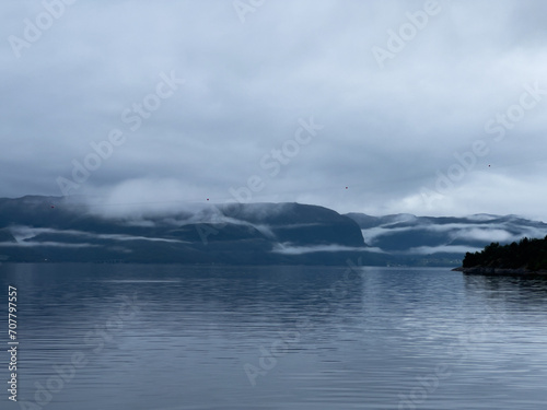 A scene of a ferry on a rainy day crossing the Sogn Fjord, Norway © Alberto Gonzalez 