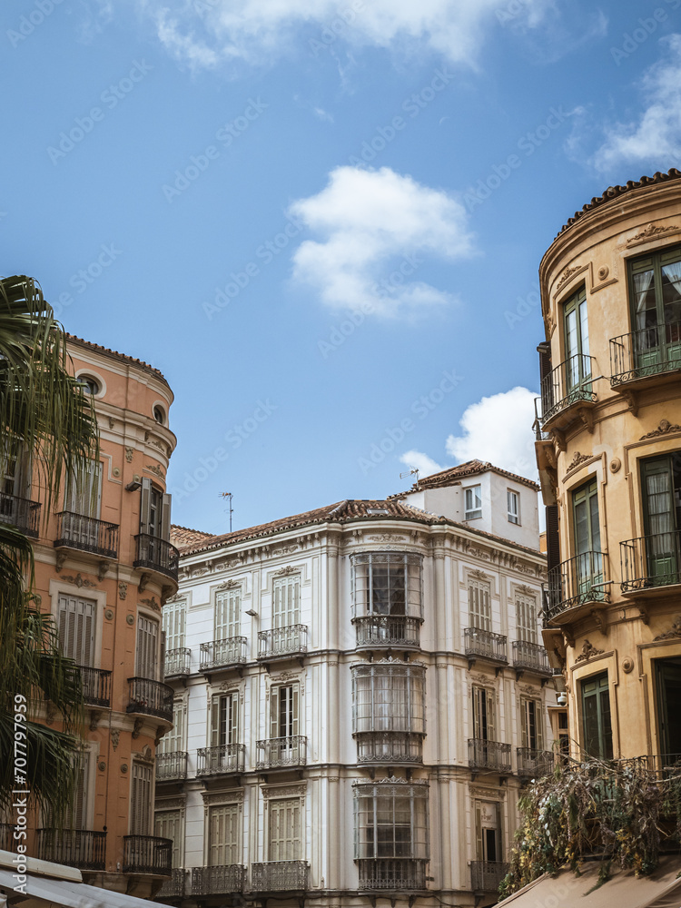 Beautiful facades of a street in the historical old town of Málaga, Andalusia, Spain