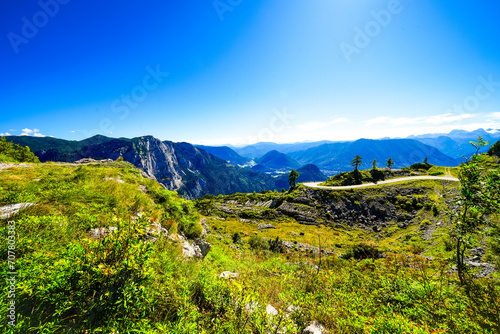View of the surrounding landscape at the Loseralm near Altaussee in the Salzkammergut in Austria. Nature with panoramic views of the mountains on the Loser Alm in Styria. 