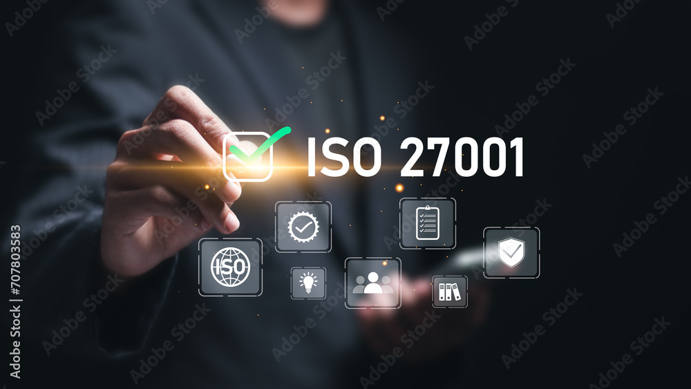 ISO 27001 concept. Businessman choose ISO 27001 for information security management system (ISMS). requirements, certification, management, standards. - obrazy, fototapety, plakaty 
