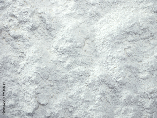 White flour texture background. Abstract powder texture. White powder surface with cracks.