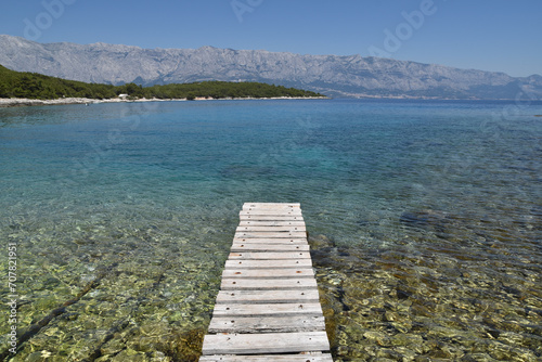 Fototapeta Naklejka Na Ścianę i Meble -  Wooden Pier Over The Adriatic Sea
