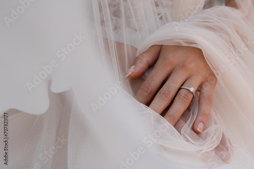 RIng wedding on white dress