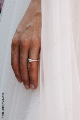 RIng wedding on white dress