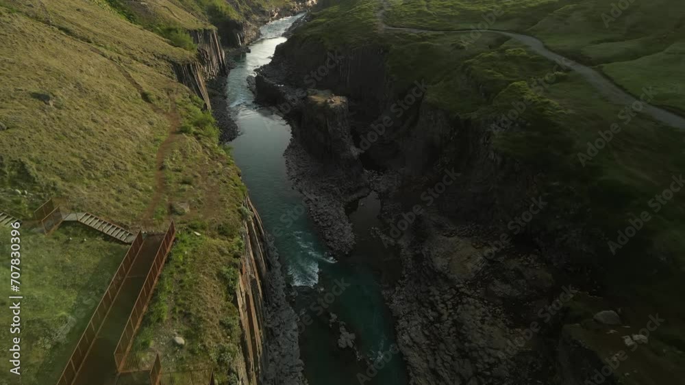 Aerial video of the dramatic basalt pillared Studlagil Canyon Aerial video of the dramatic basalt pillared Studlagil Canyon