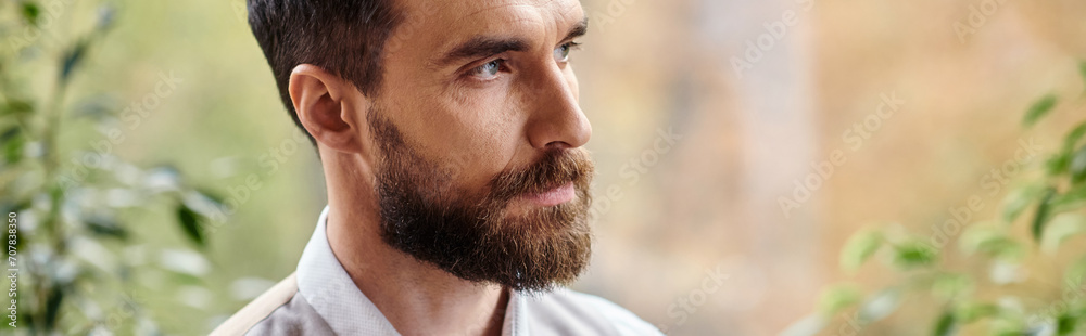 Obraz premium handsome focused leader with beard in sophisticated attire looking away, business concept, banner