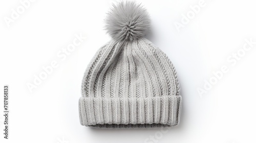 Gray knitted bobble hat flat lay isolated on white background isolated on white background, photo