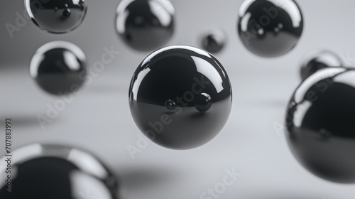 Several glossy spheres suspended in mid-air against a neutral background