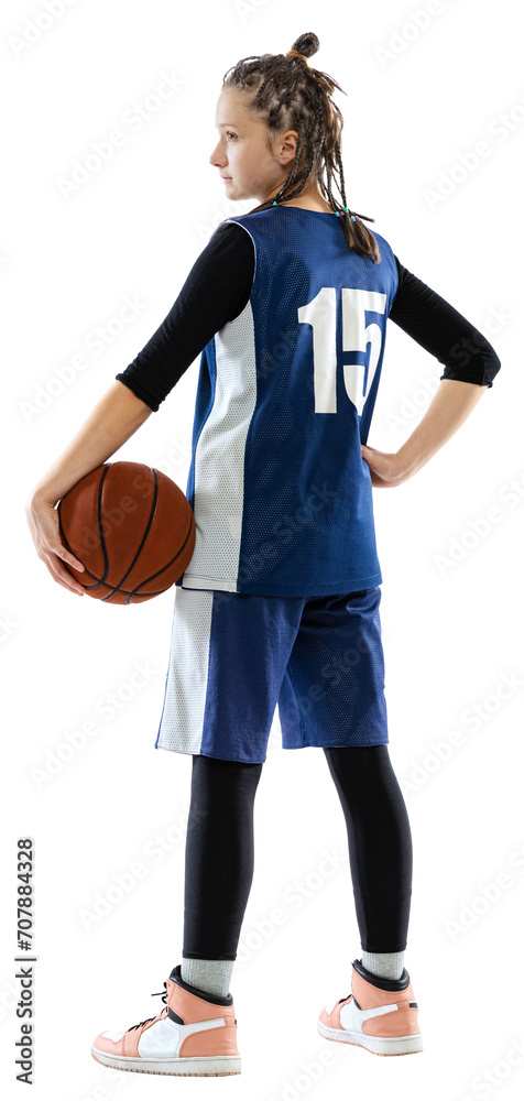 Women in Sports. Rear view portrait of young female basketball player in uniform posing with ball against transparent background. Concept of fashion sport, hobby, energy, active lifestyle.