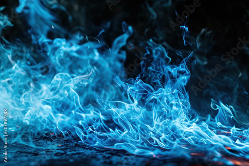 vibrant blue flame on black background
