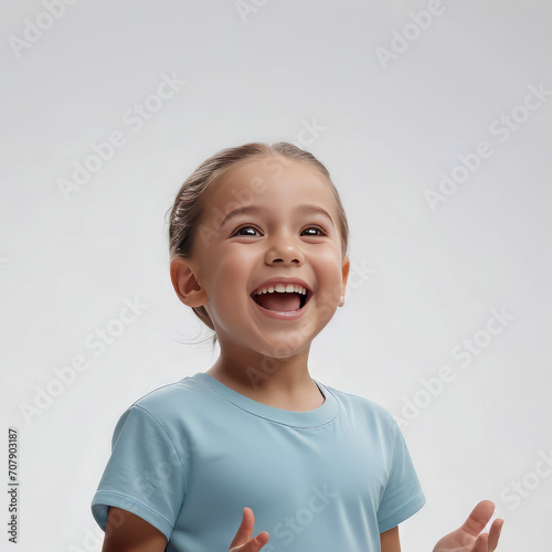 Happy cheering little child (beautiful girl or boy), isolated on white background. Portrait of a smiling surprised girl (boy),