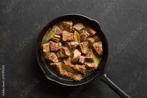 Braised beef in cast iron skillet