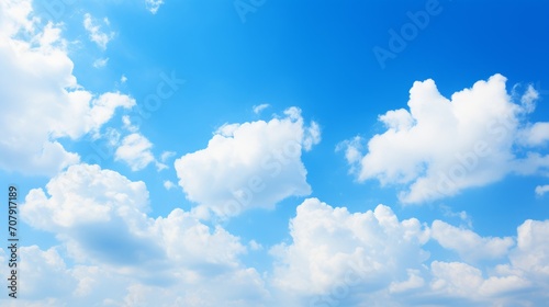 blue sky background with tiny clouds