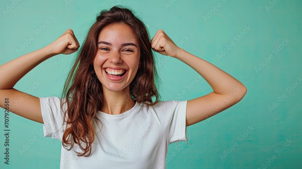 Happy young woman with arms raised Happy young woman with arms raised