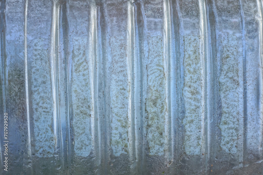 white gray texture from a piece of transparent striped plastic packaging white gray texture from a piece of transparent striped plastic packaging