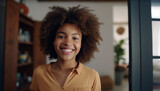 A confident young African American businesswoman smiling, looking at camera indoors generated by AI