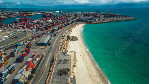 Port Beach, North Fremantle - Perth, Western Australia: 29th of october 2023: Aerial view of Port Beach and Fremantle ports with many containers to get shipped, North Fremantle.