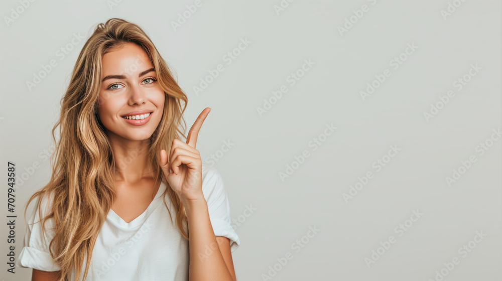 portrait of a woman pointing at empty space portrait of a woman pointing at empty space