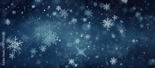 Abstract composition of snowflakes on a dark winter background  representing the Christmas and New Year concept.