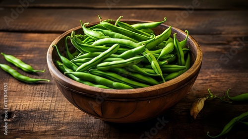 Green beans on wooden vintage table top view. Organic farm food.