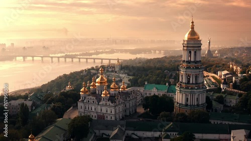 St. Michael's golden-domed monastery in Kyiv, aerial view capital of Ukraine during sunset photo