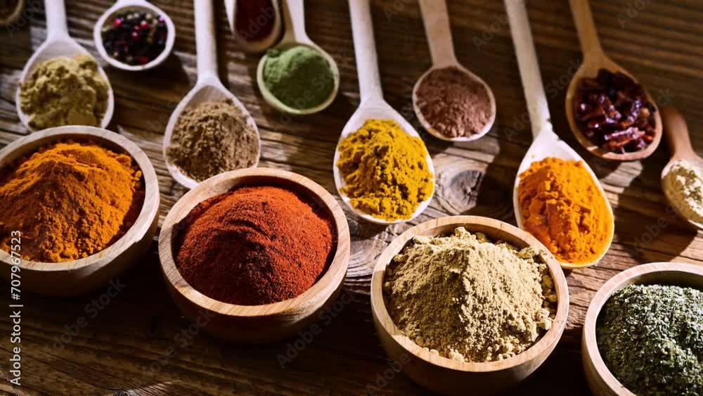 Variety of spices and herbs on the table Variety of spices and herbs on the table