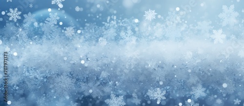 Abstract winter background with white snow crystals.
