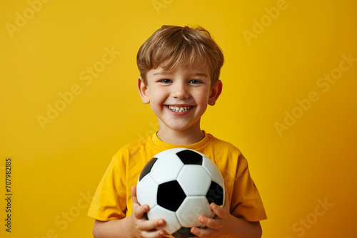 Expressive Youth with Bright Teeth, Holding Soccer Ball in Isolation