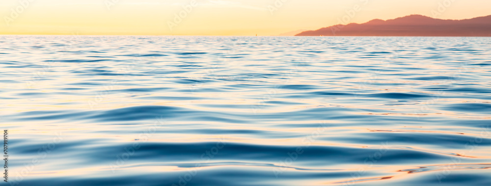 Ocean Waves at Sunset. Nature Background Panorama.
