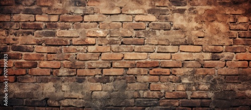 Vintage brick wall with aged texture, suitable for text.